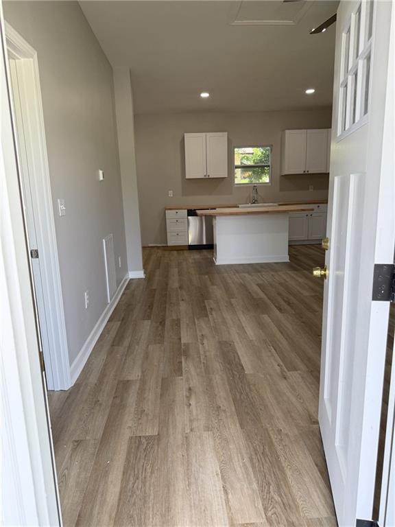 1300 Murphy Avenue LaGrange, GA 30240 - Photo 19 of 24 a view of a kitchen with wooden floor and a sink