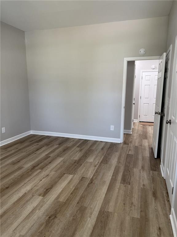 1300 Murphy Avenue LaGrange, GA 30240 - Photo 20 of 24 a view of a room with wooden floor and staircase