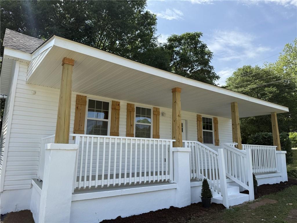 1300 Murphy Avenue LaGrange, GA 30240 - Photo 2 of 24 a view of a house with a small yard and wooden fence
