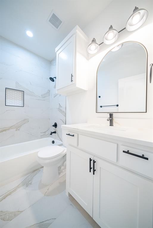 3411 Ladd Street Dallas, TX 75212 - Photo 7 of 14 a bathroom with a sink a toilet and bathtub