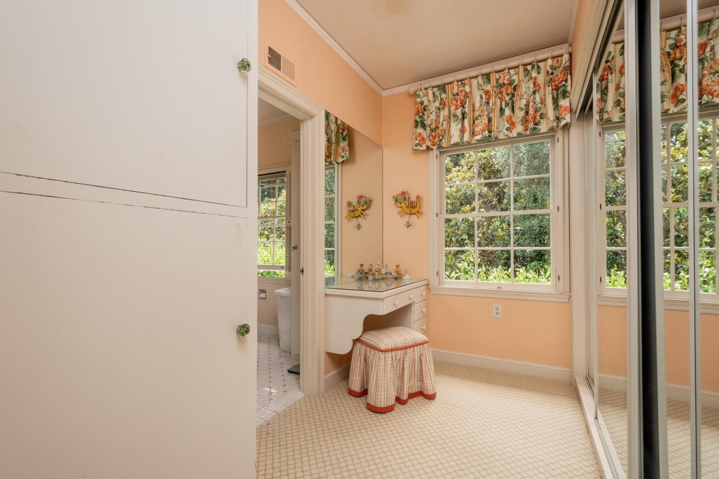 720 Eucalyptus Avenue Hillsborough, CA 94010 - Photo 32 of 48 a bathroom with a bathtub and shower