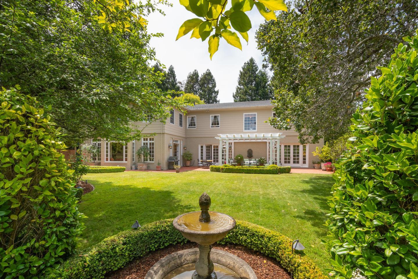 720 Eucalyptus Avenue Hillsborough, CA 94010 - Photo 38 of 48 a house view with a outdoor space
