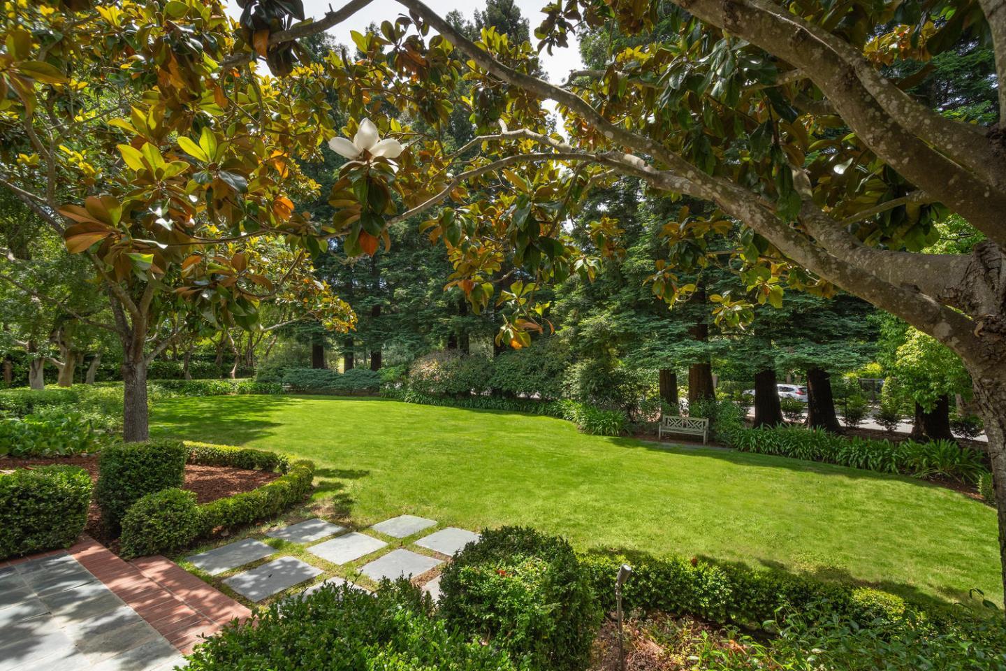 720 Eucalyptus Avenue Hillsborough, CA 94010 - Photo 5 of 48 a view of a park with large trees