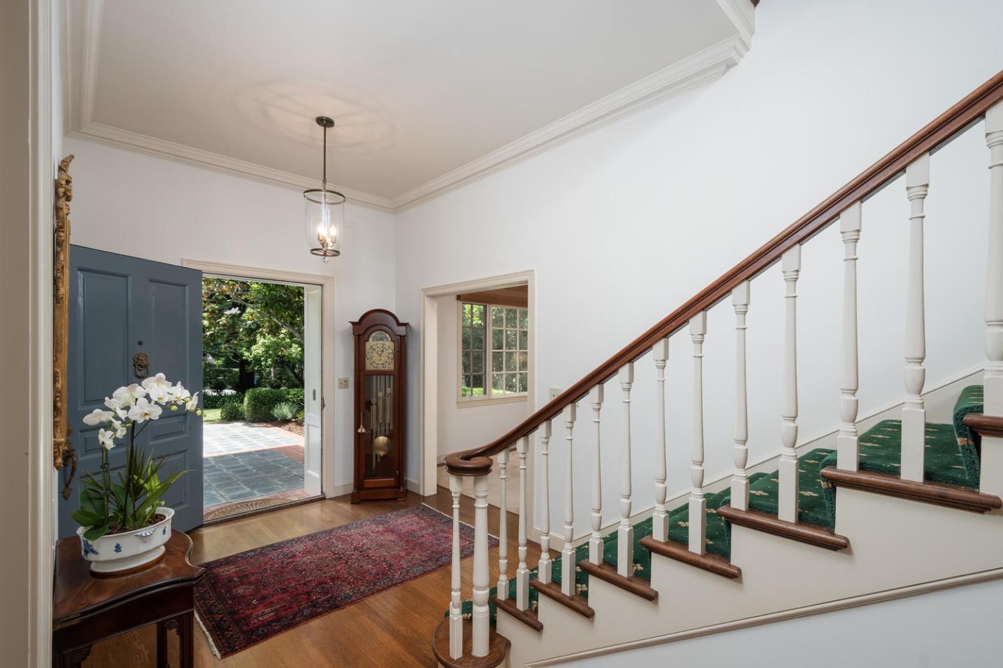 720 Eucalyptus Avenue Hillsborough, CA 94010 - Photo 9 of 48 a view of an entryway with wooden floor and livingroom view