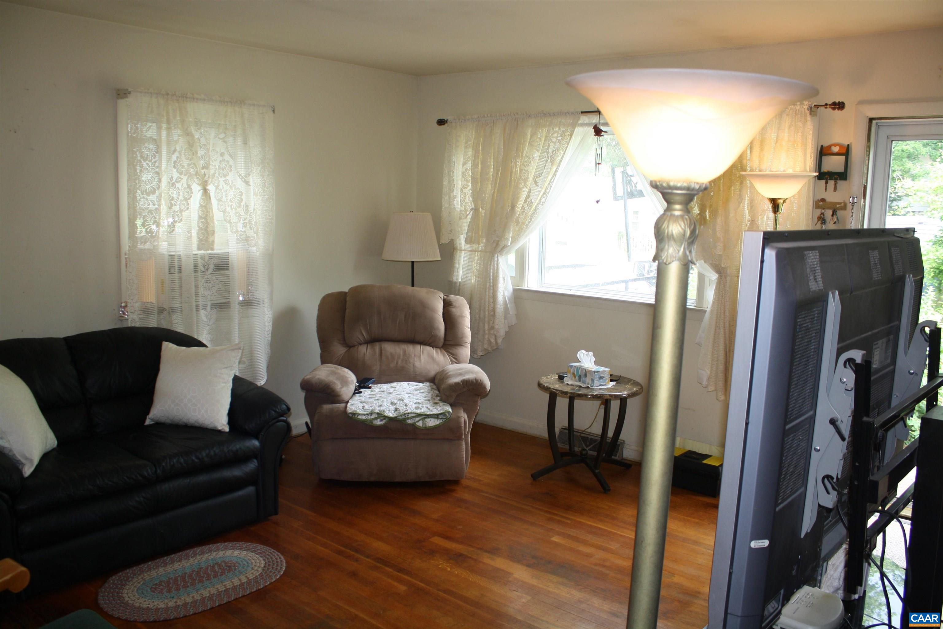 1641 Meridian Street Charlottesville, VA 22902 - Photo 3 of 21 a living room with furniture and a window