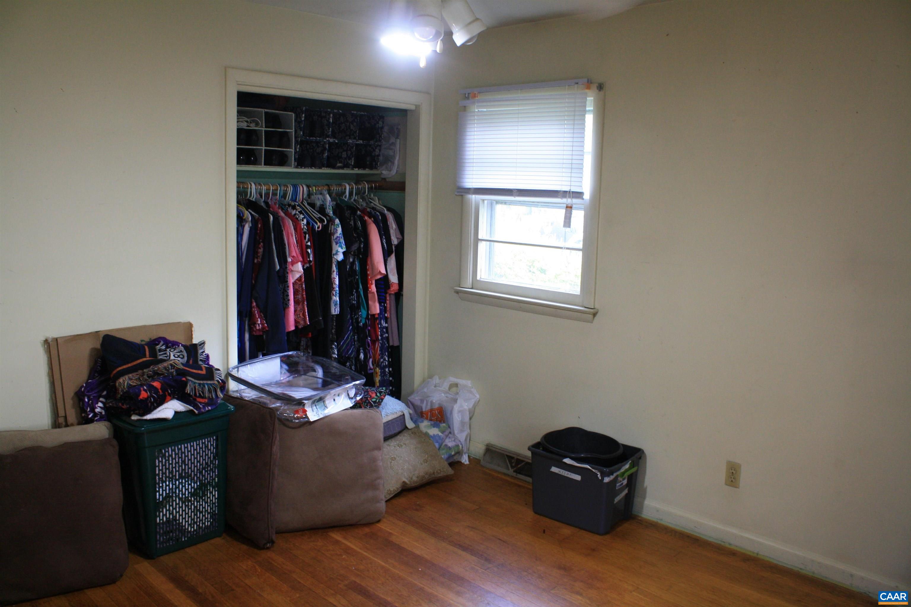 1641 Meridian Street Charlottesville, VA 22902 - Photo 9 of 21 a view of walk in closet with clothes and shoes