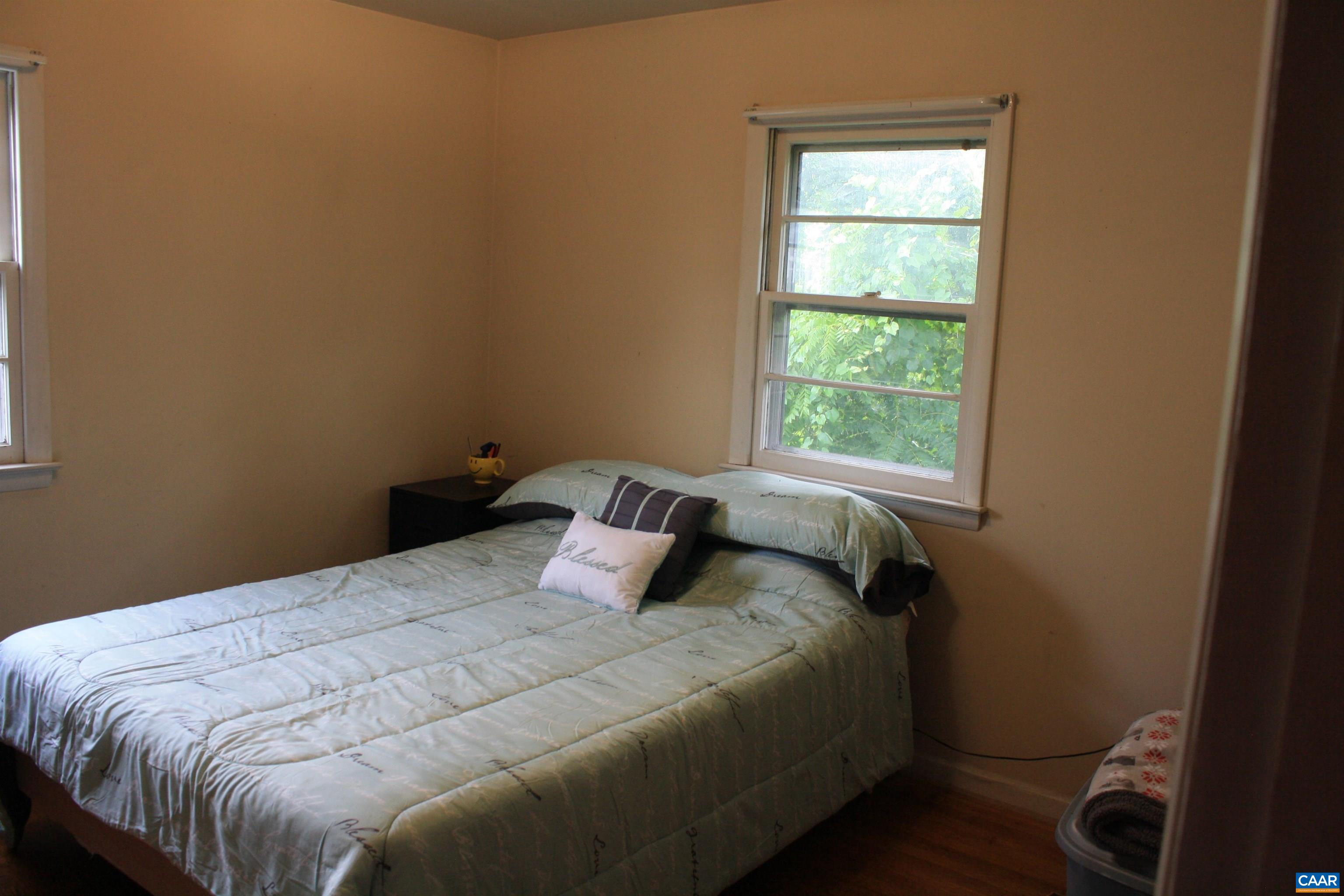1641 Meridian Street Charlottesville, VA 22902 - Photo 10 of 21 a bedroom with a bed and a window
