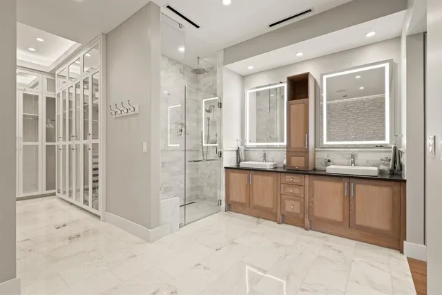 a view of living room with a fireplace and cabinet