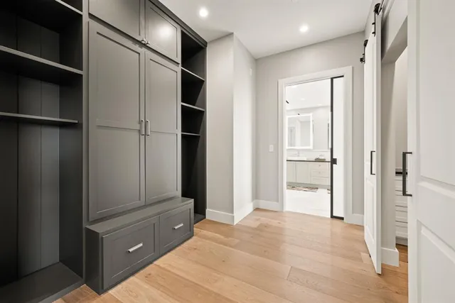 a bath tub sitting next to a window