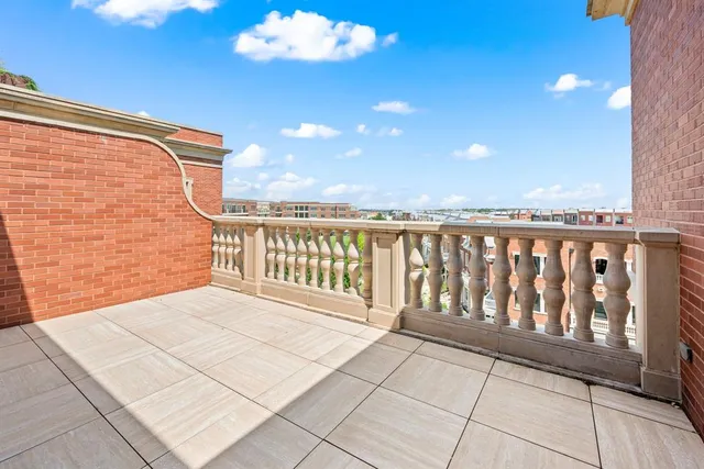 a view of a city with tall buildings