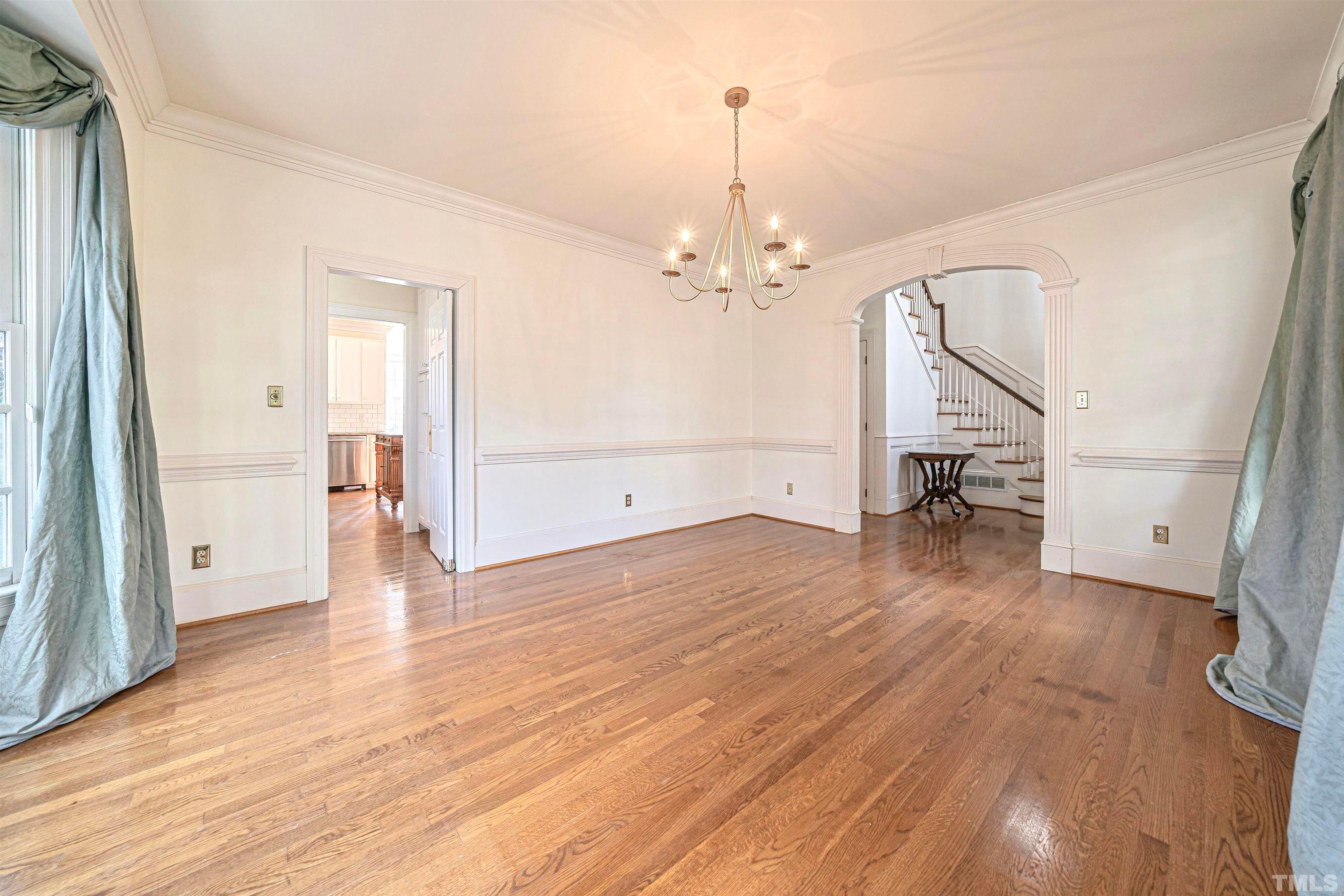 709 Runnymede Road Raleigh, NC 27607 - Photo 12 of 50 a view of empty room with wooden floor