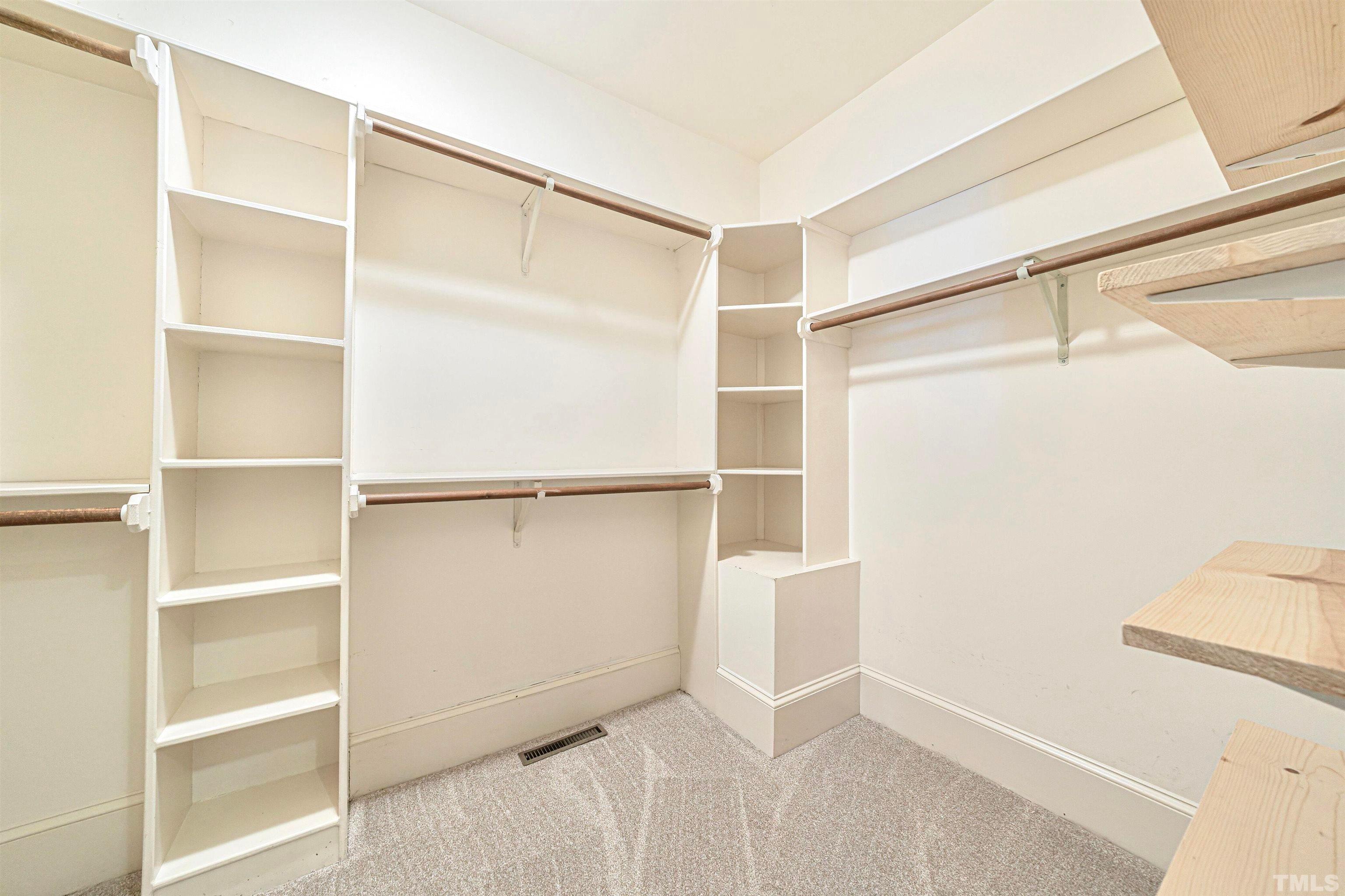 709 Runnymede Road Raleigh, NC 27607 - Photo 30 of 50 a view of an empty walk in closet
