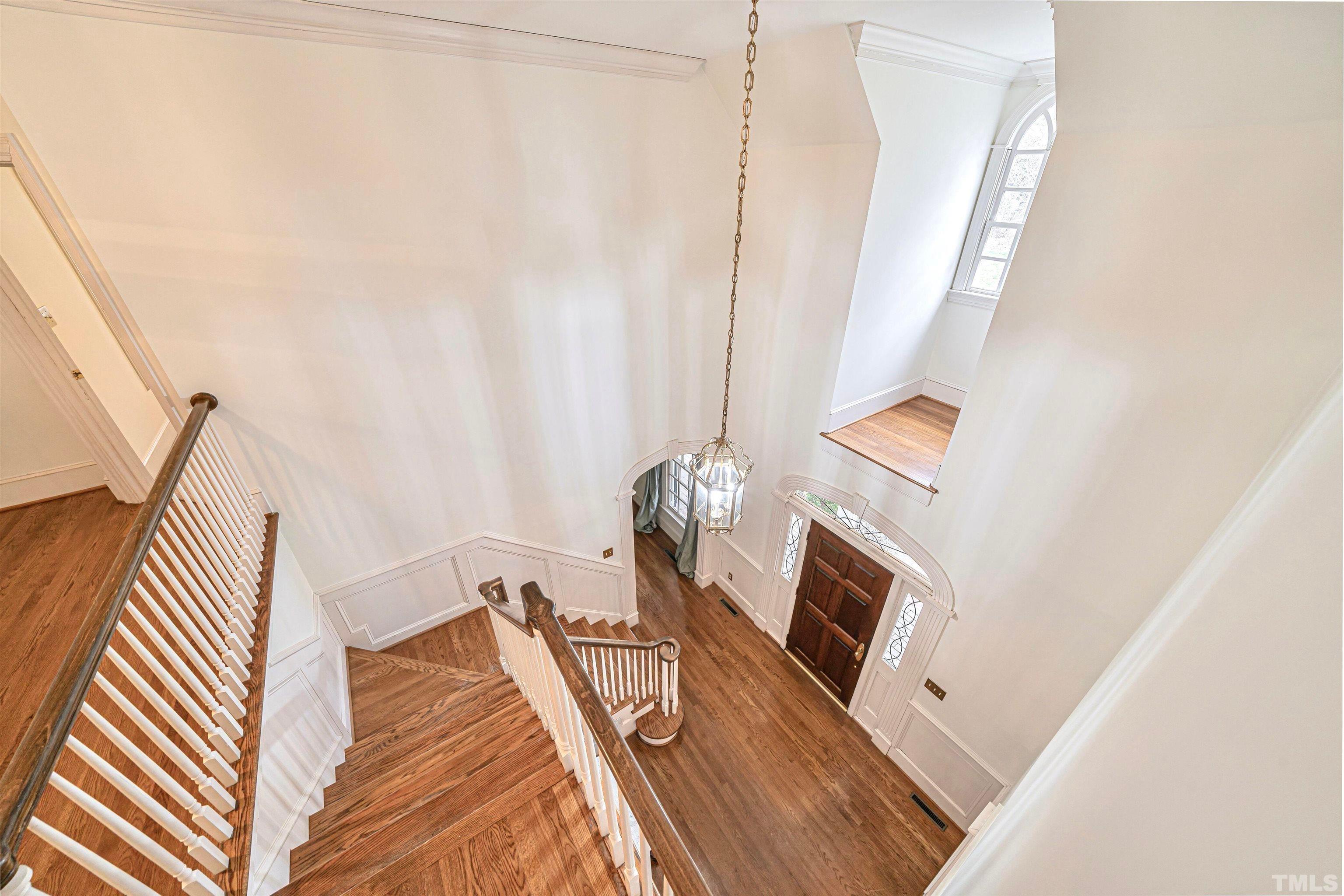 709 Runnymede Road Raleigh, NC 27607 - Photo 31 of 50 a view of a livingroom with furniture and a fireplace
