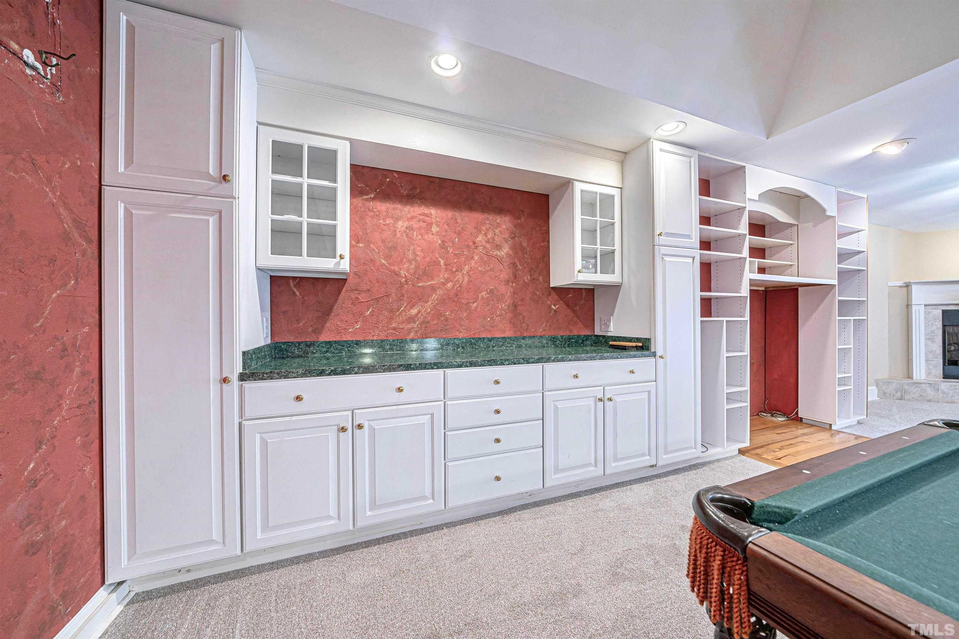 709 Runnymede Road Raleigh, NC 27607 - Photo 50 of 50 a spacious bathroom with a granite countertop sink and a mirror