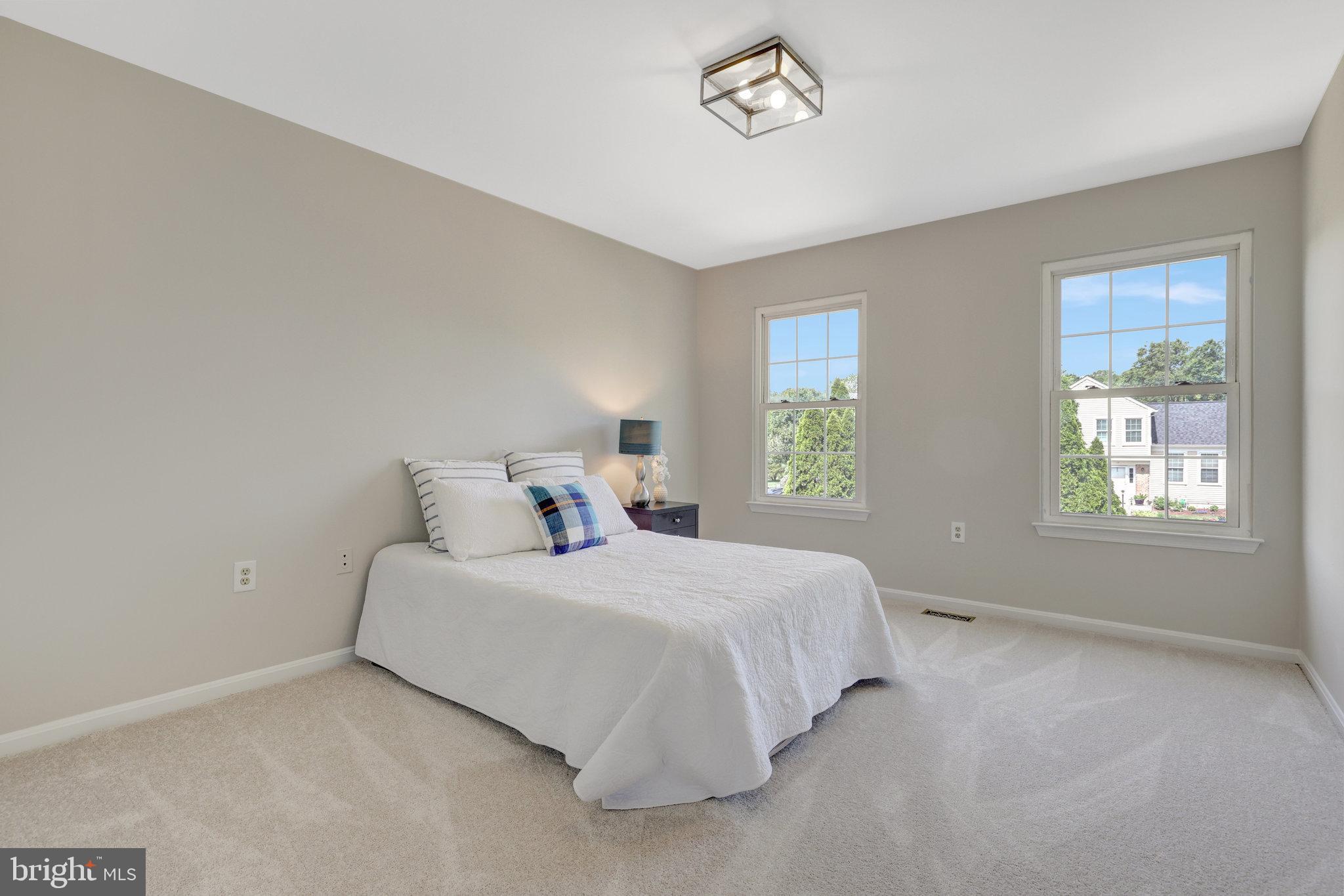 73 McPherson Circle Sterling, VA 20165 - Photo 45 of 74 a bedroom with a bed and a window
