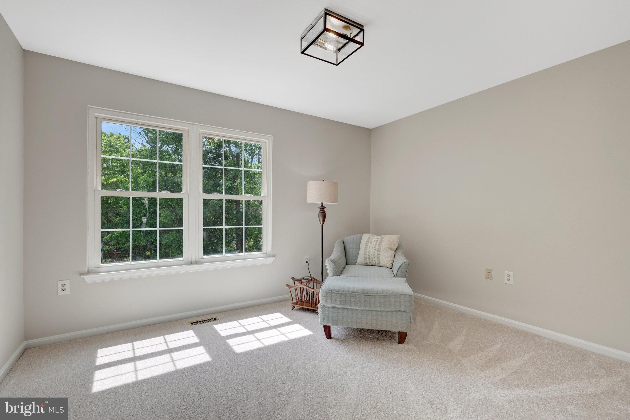 73 McPherson Circle Sterling, VA 20165 - Photo 47 of 74 a living room with furniture and a window