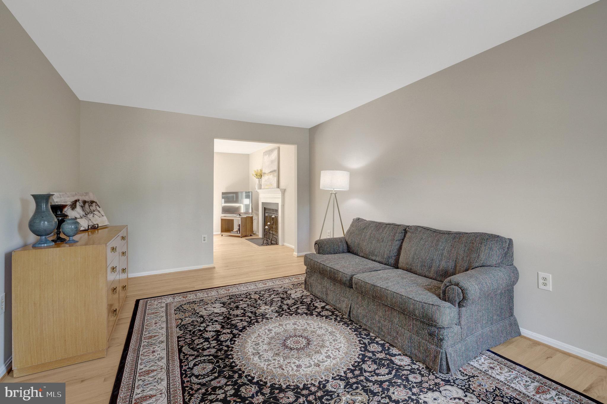 73 McPherson Circle Sterling, VA 20165 - Photo 8 of 74 a living room with furniture and a window