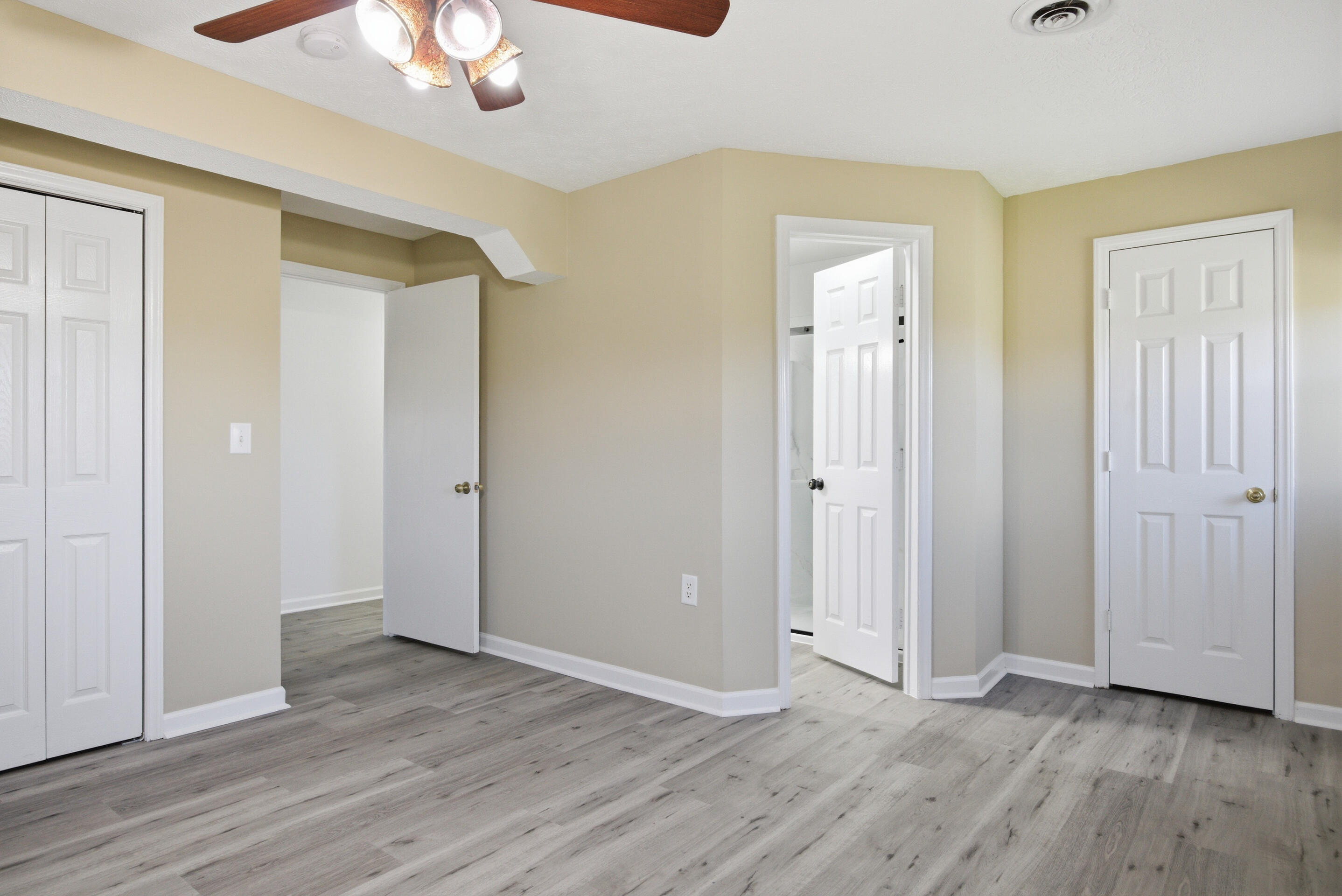 6458 Piney Woods Road Riner, VA 24149 - Photo 16 of 50 a view of an empty room with wooden floor