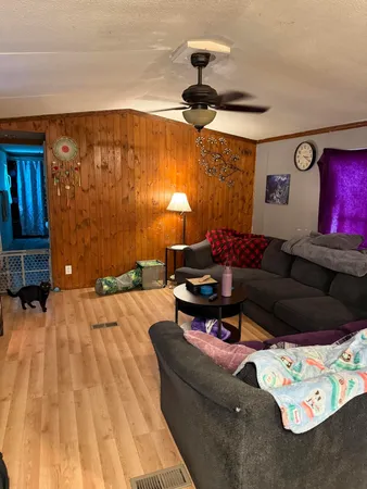 a living room with furniture and a couch