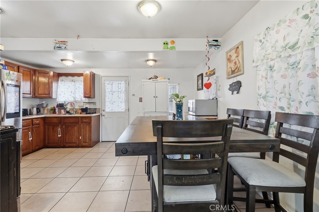 440 West Cherry Street Compton, CA 90222 - Photo 11 of 28 a kitchen with a cabinets and counter space