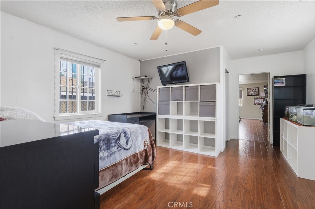 440 West Cherry Street Compton, CA 90222 - Photo 23 of 28 a bedroom with a bed and a window
