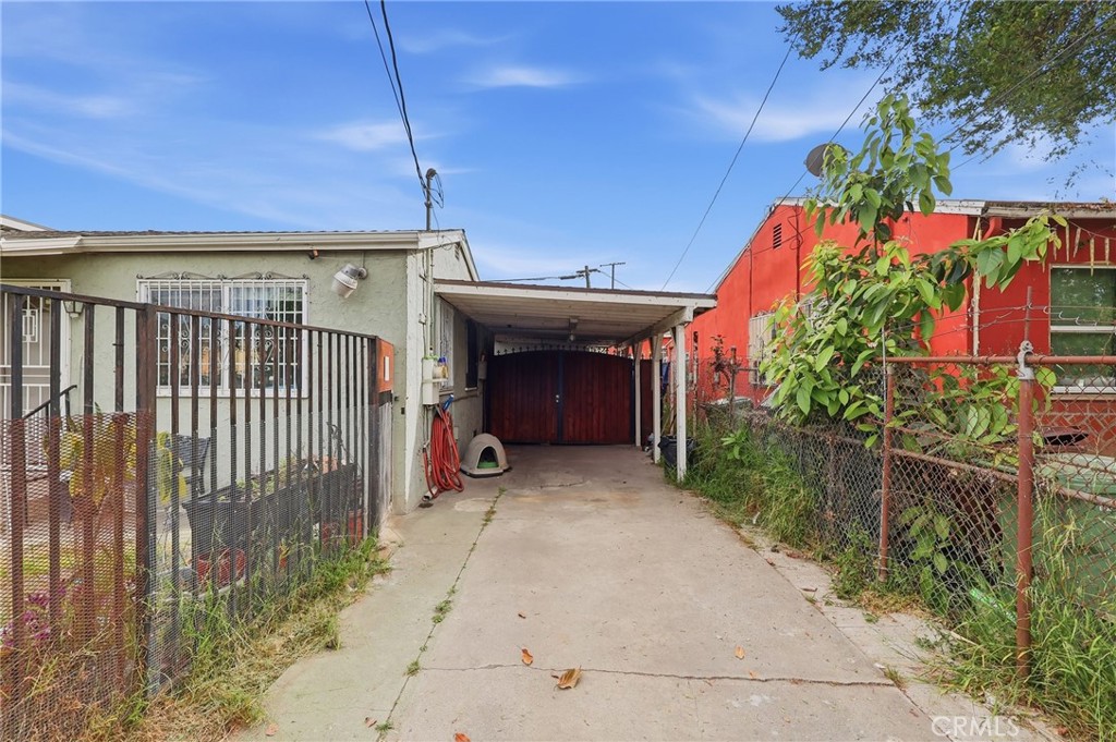 440 West Cherry Street Compton, CA 90222 - Photo 27 of 28 a view of a patio with table and chairs and potted plants