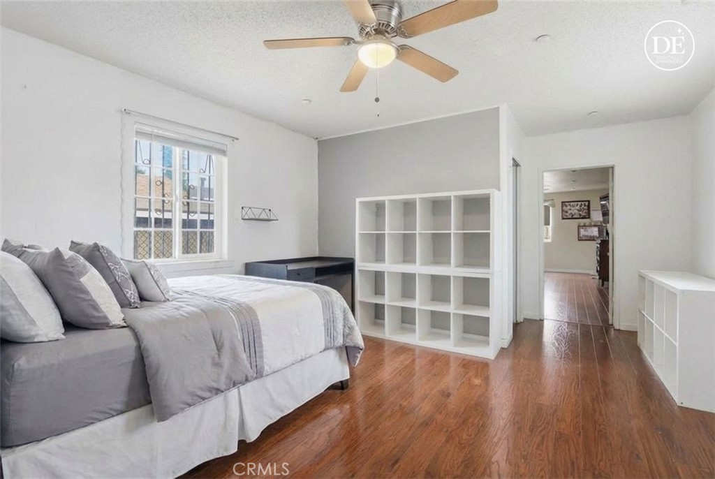 440 West Cherry Street Compton, CA 90222 - Photo 5 of 28 a bedroom with a bed and a window