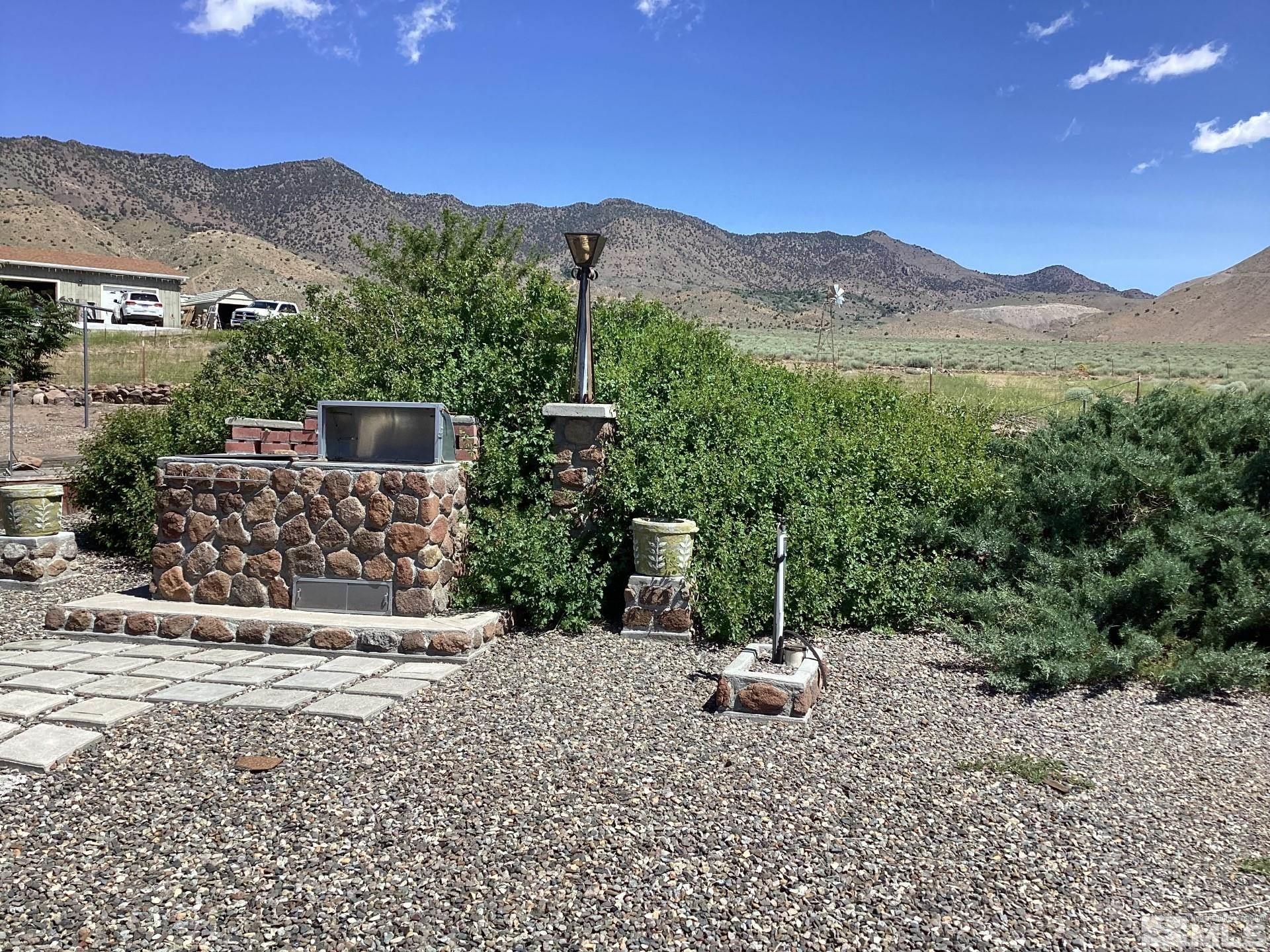 217 Territory Road Dayton, NV 89403 - Photo 13 of 15 a view of a terrace with a mountain