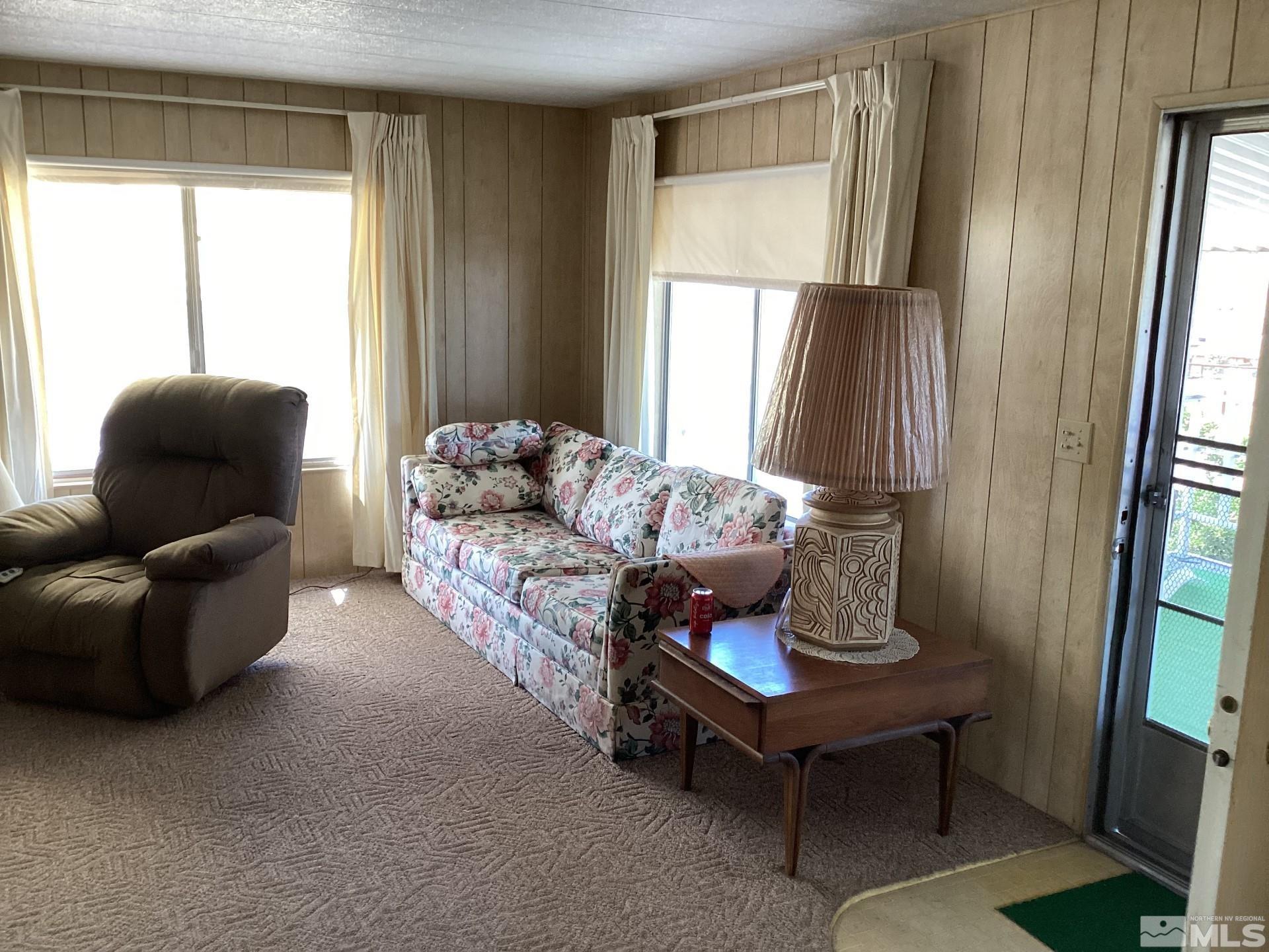 217 Territory Road Dayton, NV 89403 - Photo 5 of 15 a living room with furniture and a window