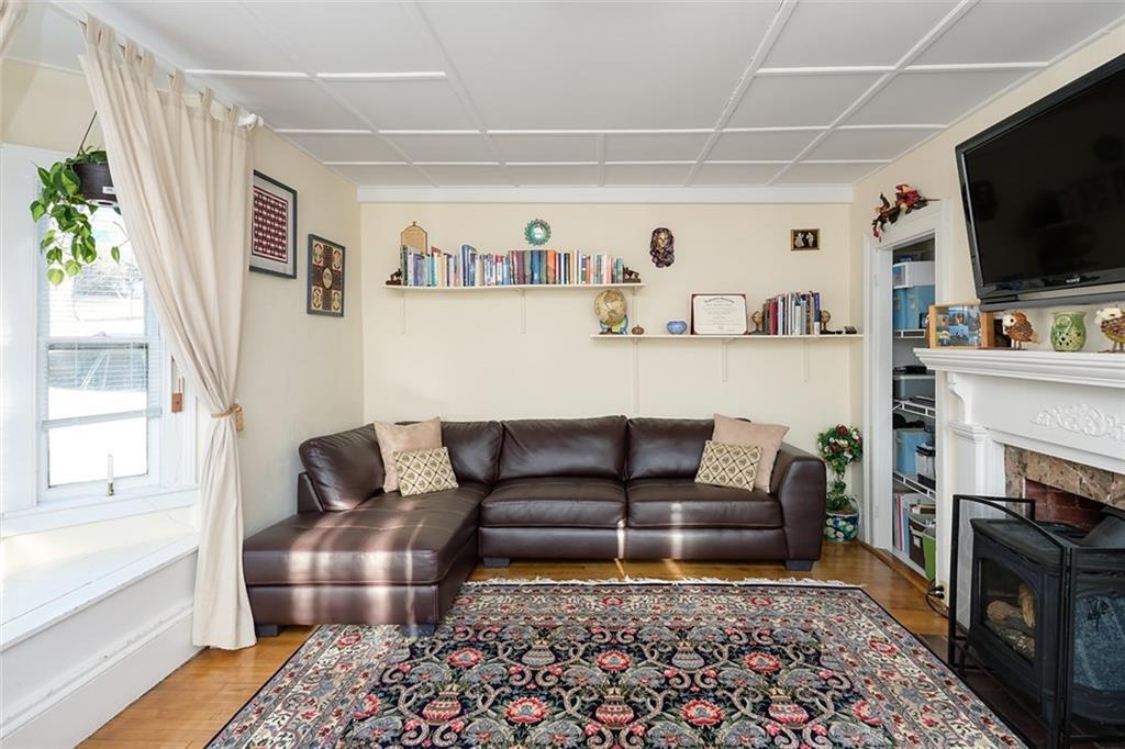 61 Long Sands Road York, ME 03909 - Photo 11 of 34 Cozy living room with classic window...
