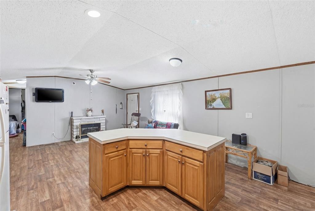 10501 East Patience Lane Inverness, FL 34450 - Photo 12 of 37 a kitchen with a sink appliances and cabinets