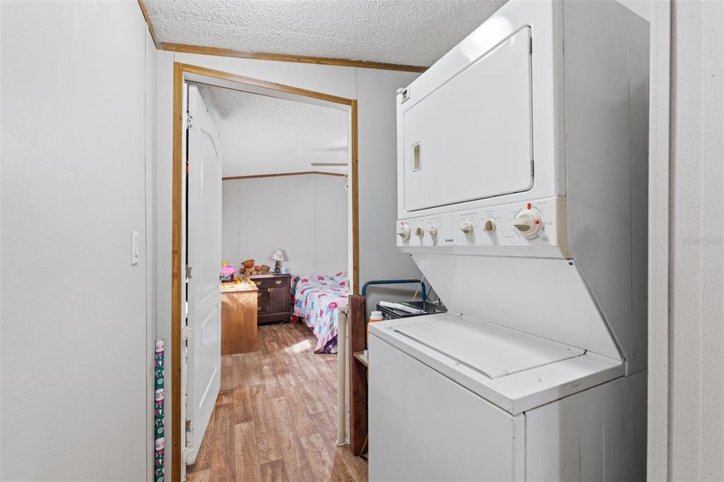 10501 East Patience Lane Inverness, FL 34450 - Photo 14 of 37 a utility room with dryer and washer