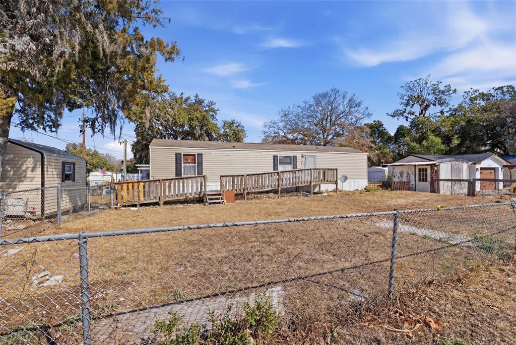 10501 East Patience Lane Inverness, FL 34450 - Photo 2 of 37 a view of house with outdoor space