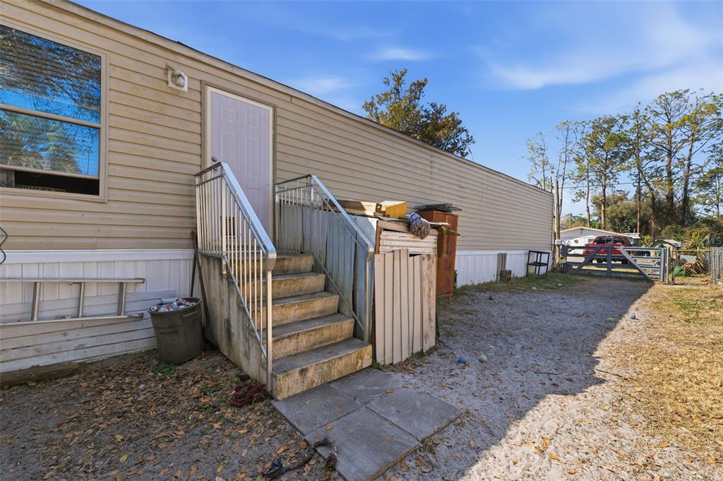 10501 East Patience Lane Inverness, FL 34450 - Photo 21 of 37 a view of a house with a yard