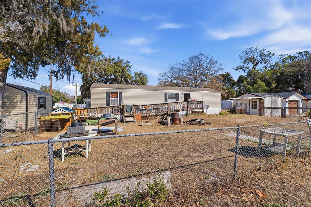 10501 East Patience Lane Inverness, FL 34450 - Photo 23 of 37 a view of a house with sitting area and furniture