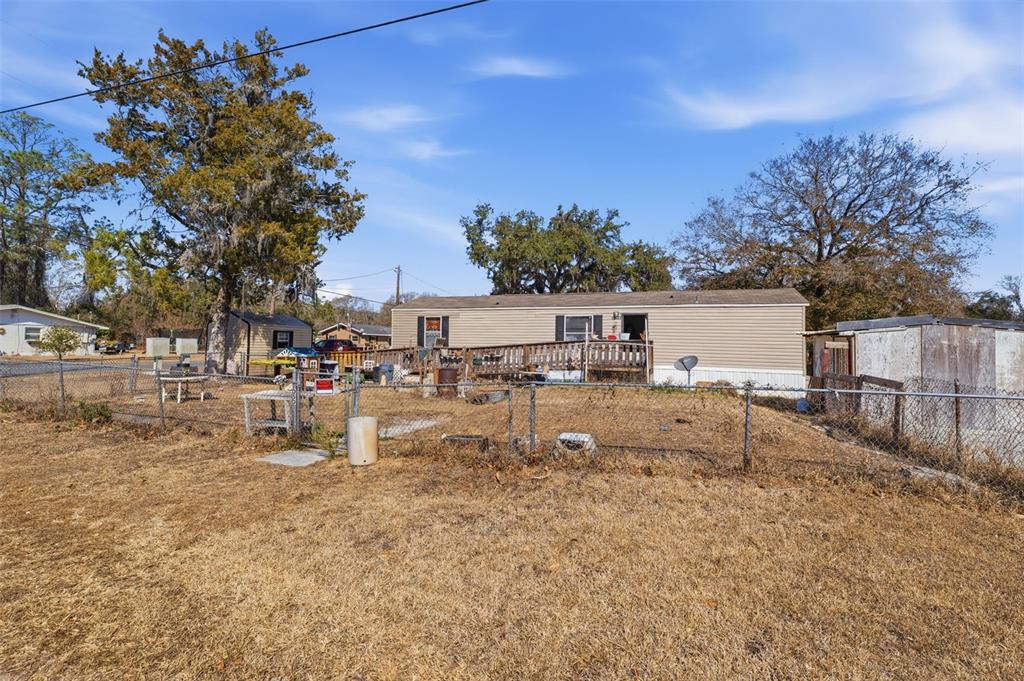 10501 East Patience Lane Inverness, FL 34450 - Photo 25 of 37 a view of a lake with houses