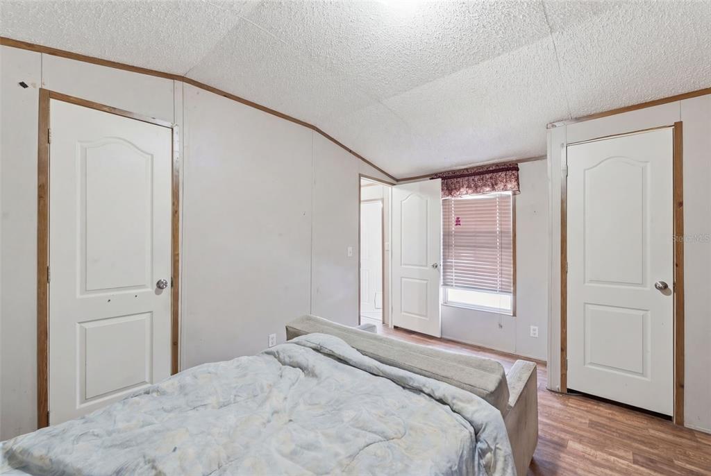 10501 East Patience Lane Inverness, FL 34450 - Photo 37 of 37 a bedroom with a bed and a window