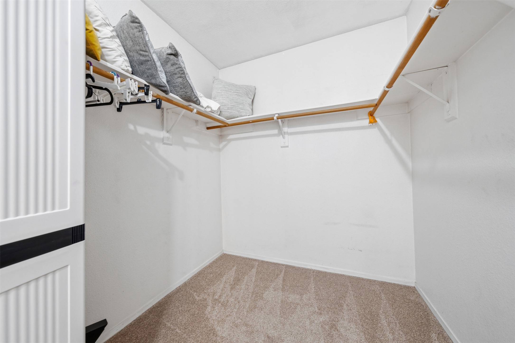 12906 Humphrey Drive Austin, TX 78729 - Photo 28 of 40 a view of a room with racks on the wall