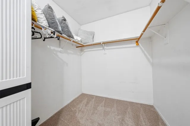 a view of a room with racks on the wall