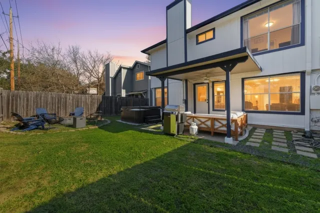 a view of a chairs in front of house