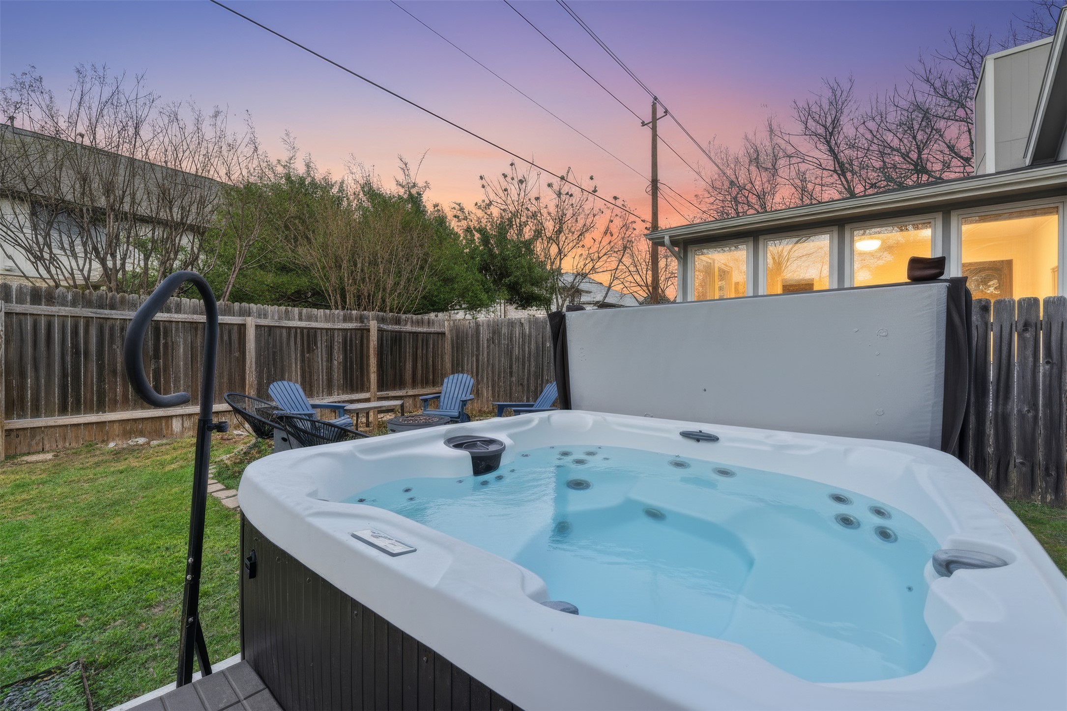 12906 Humphrey Drive Austin, TX 78729 - Photo 32 of 40 a backyard of a house with table and chairs