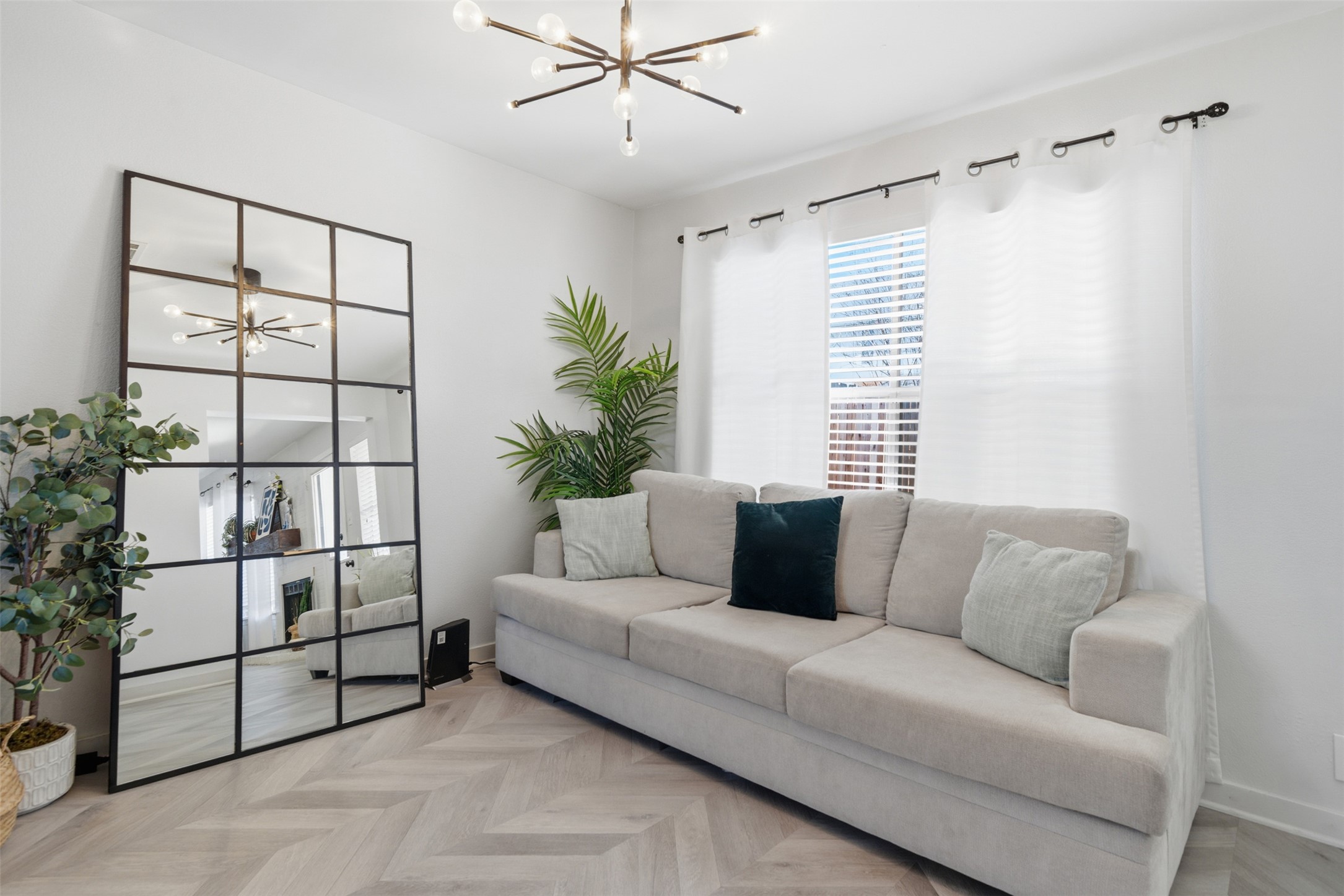 12906 Humphrey Drive Austin, TX 78729 - Photo 7 of 40 a living room with furniture and a large window
