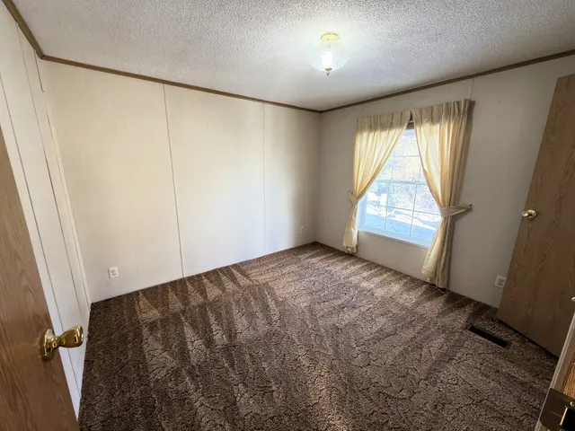 a view of kitchen and utility room