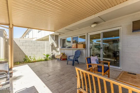a view of a porch with furniture