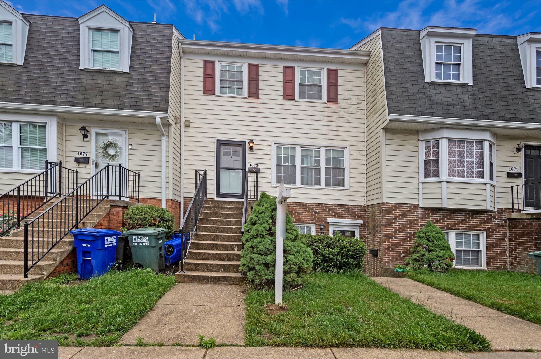1675 Ridgely Court, Unit 182 Crofton, MD 21114 - Photo 12 of 47 a front view of house with yard and green space