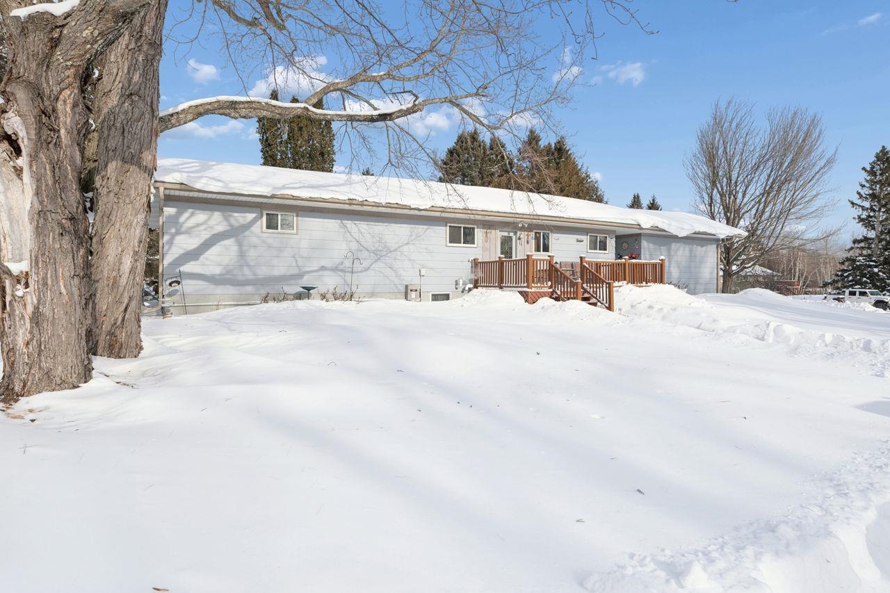 65915 Selke Road Mason, WI 54856 - Photo 27 of 33 Snow covered property with a wooden deck