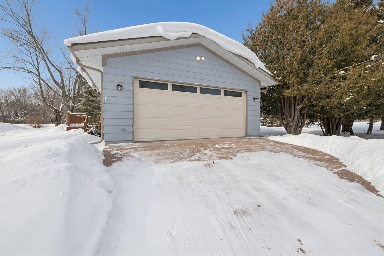 65915 Selke Road Mason, WI 54856 - Photo 33 of 33 Snow covered garage with a detached garage
