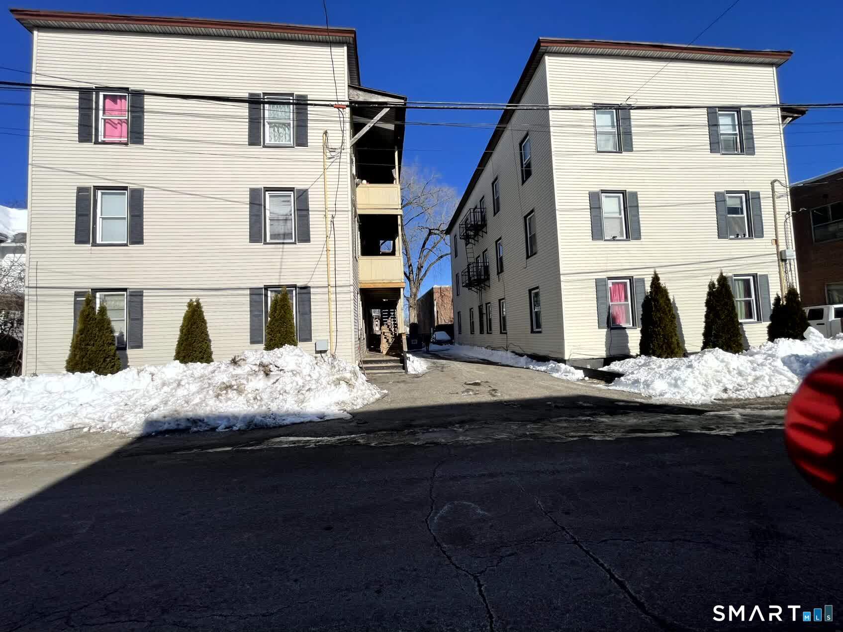 a front view of a building with streets