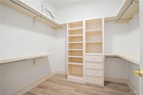 a view of an empty walk in closet