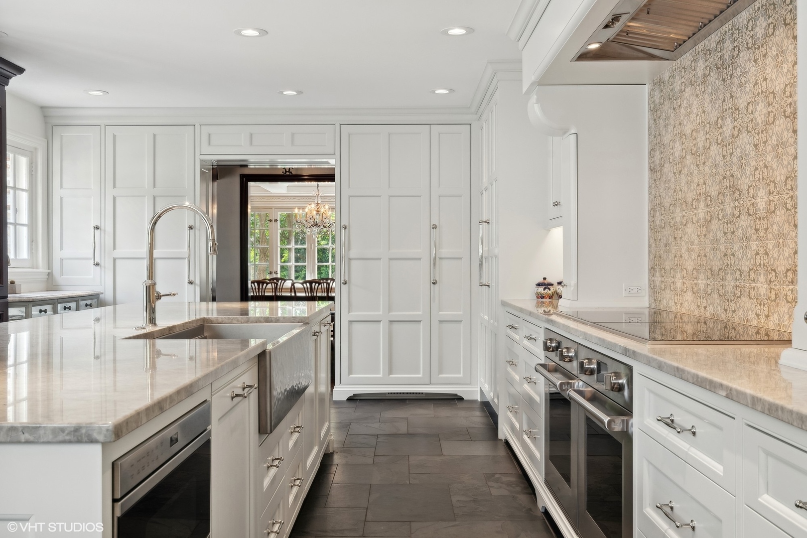 885 Maplewood Road Lake Forest, IL 60045 - Photo 14 of 78 a kitchen with stainless steel appliances granite countertop a stove and a sink
